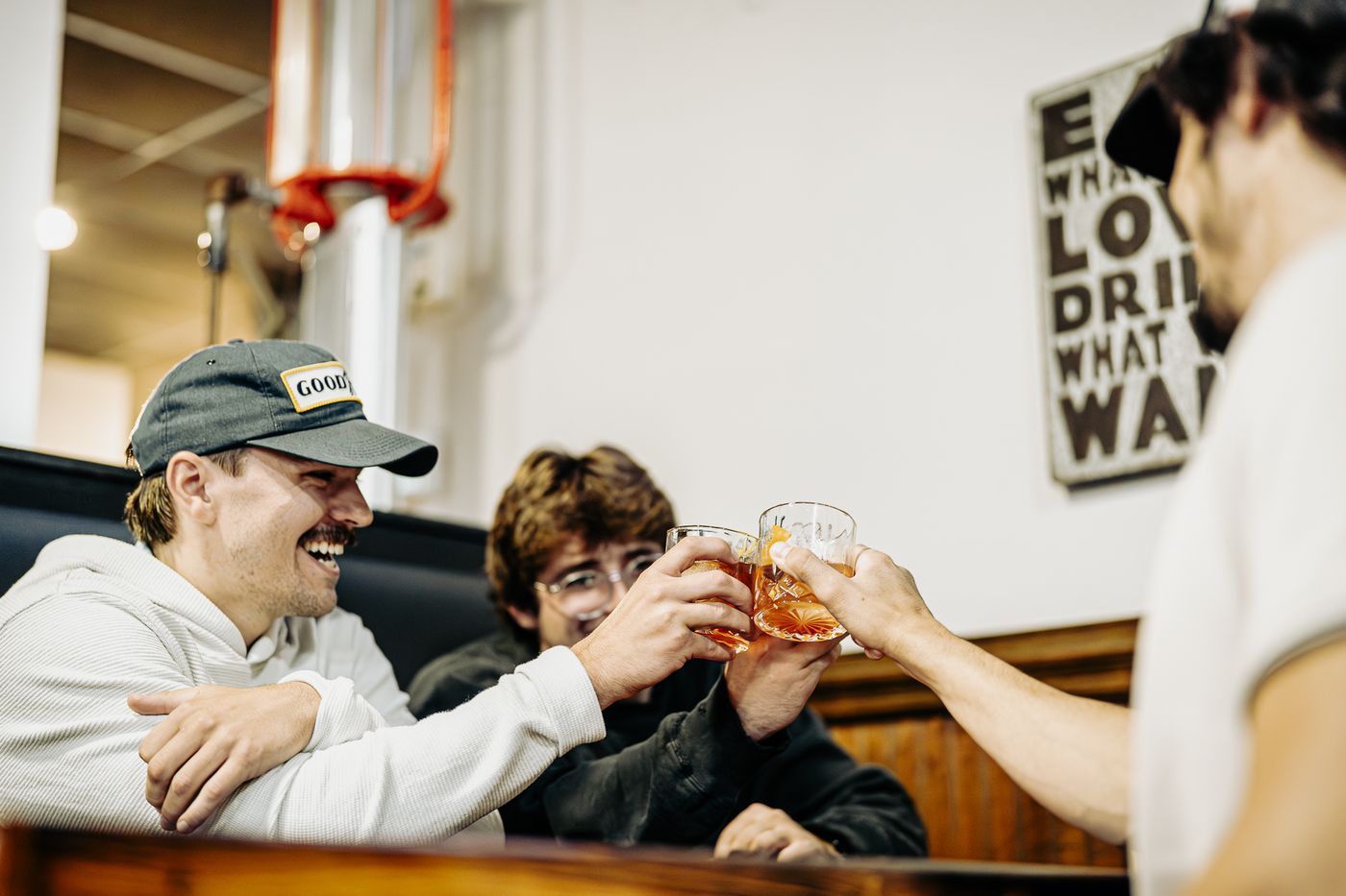 Braden, Trevor and Gabe sharing a bourbon cheers at StokeRidge
